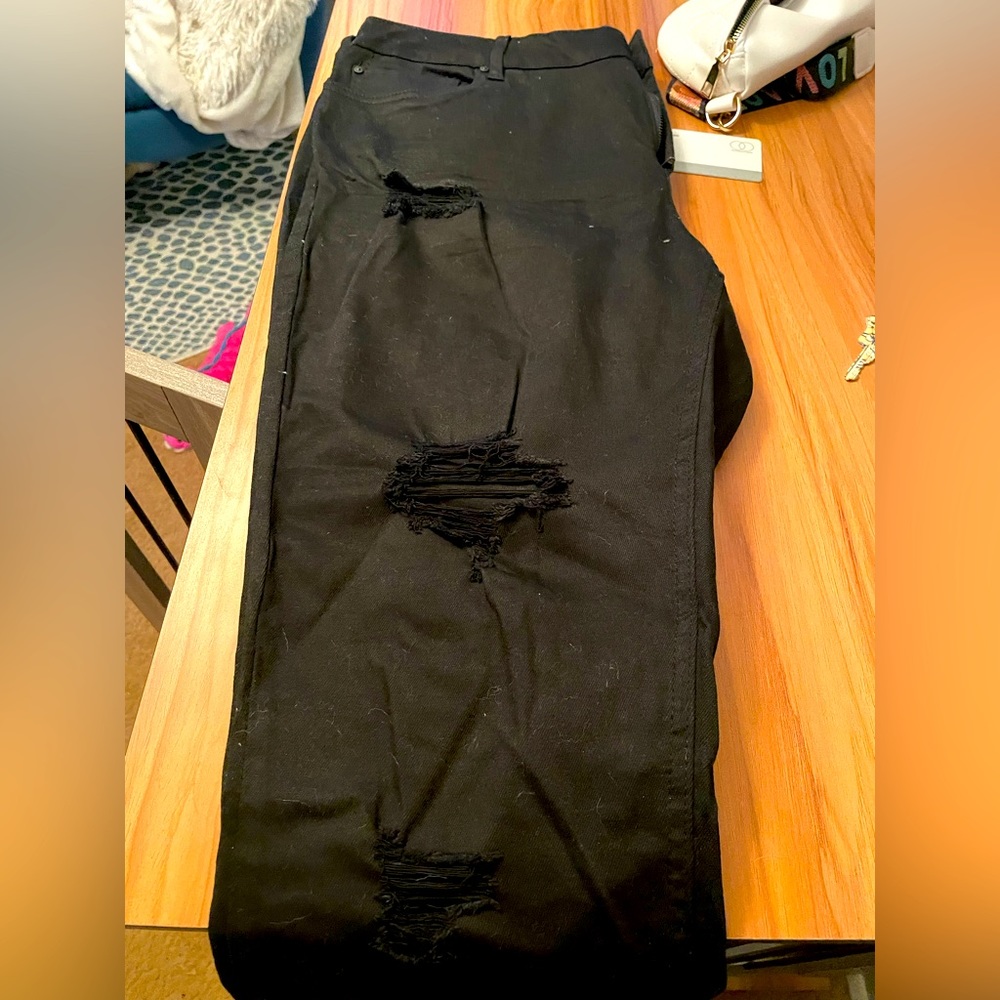 Black distressed jeans never worn